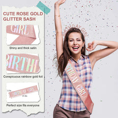 Woman wearing Aurmigle rose gold birthday crown for women with matching glitter sash smiling and celebrating