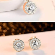 Rose-gold crystal stud earrings with halo setting and round clear stones
