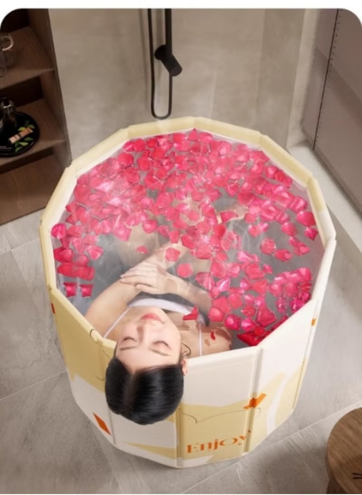 Huitich safe baby bathtub for 0-5 years filled with water and rose petals in modern bathroom