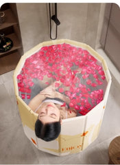 Huitich safe baby bathtub for 0-5 years filled with water and rose petals in modern bathroom