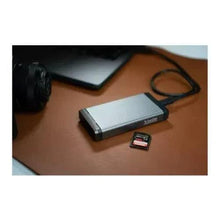 MicroSD card with SD adapter, small red/black 256GB card and gray adapter