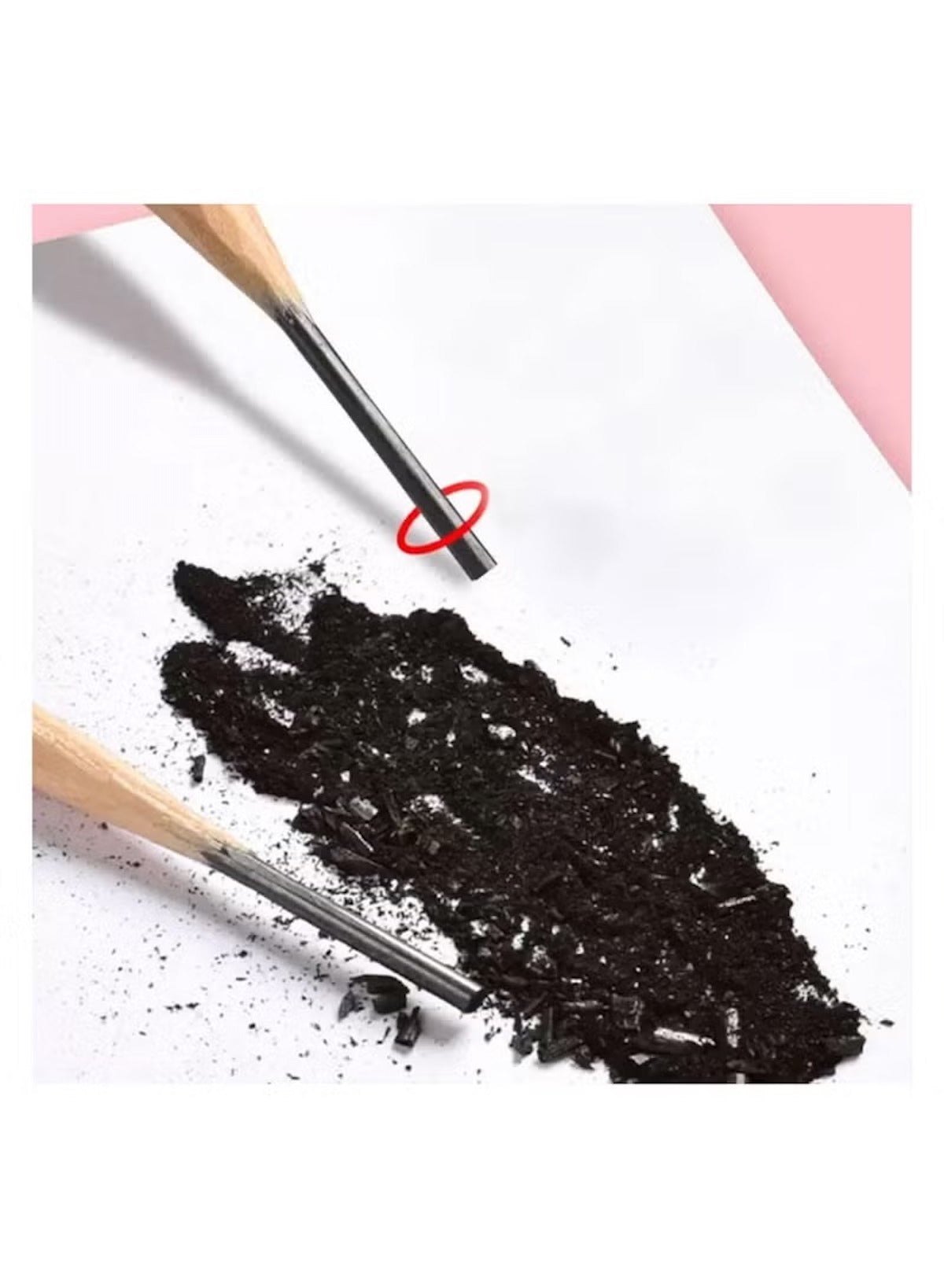 Sanrio pencil set with accessories featuring graphite shavings on paper with wooden pencil tips