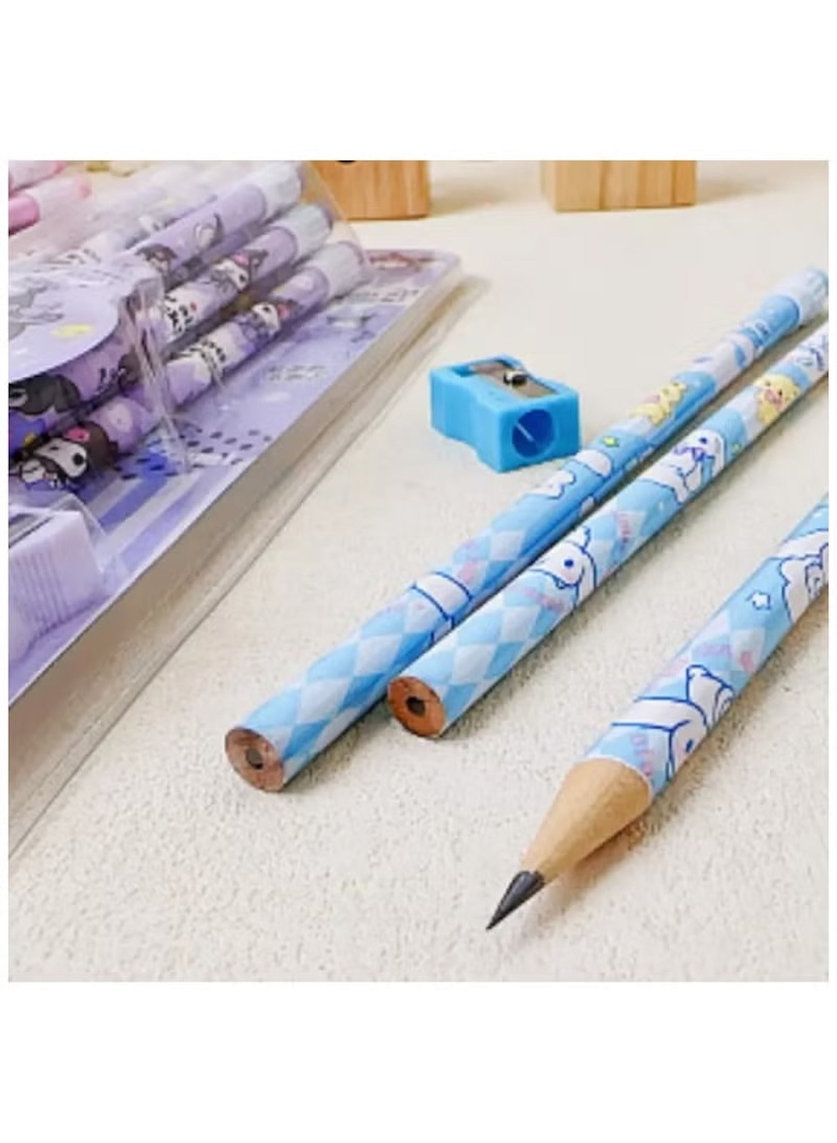 Huitich Sanrio pencil set with accessories featuring colorful designs and a pencil sharpener