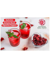 Hibiscus flower infusion setup: red tea in cups with hibiscus petals in a bowl