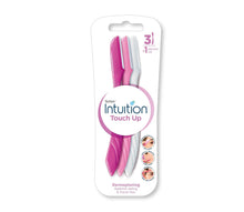 Schick Intuition touch-up dermaplaning face razor with pink handle and precision cover