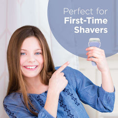 Smiling teen holding a razor and pointing to label perfect for first time shavers Schick Intuition razor refill cartridges