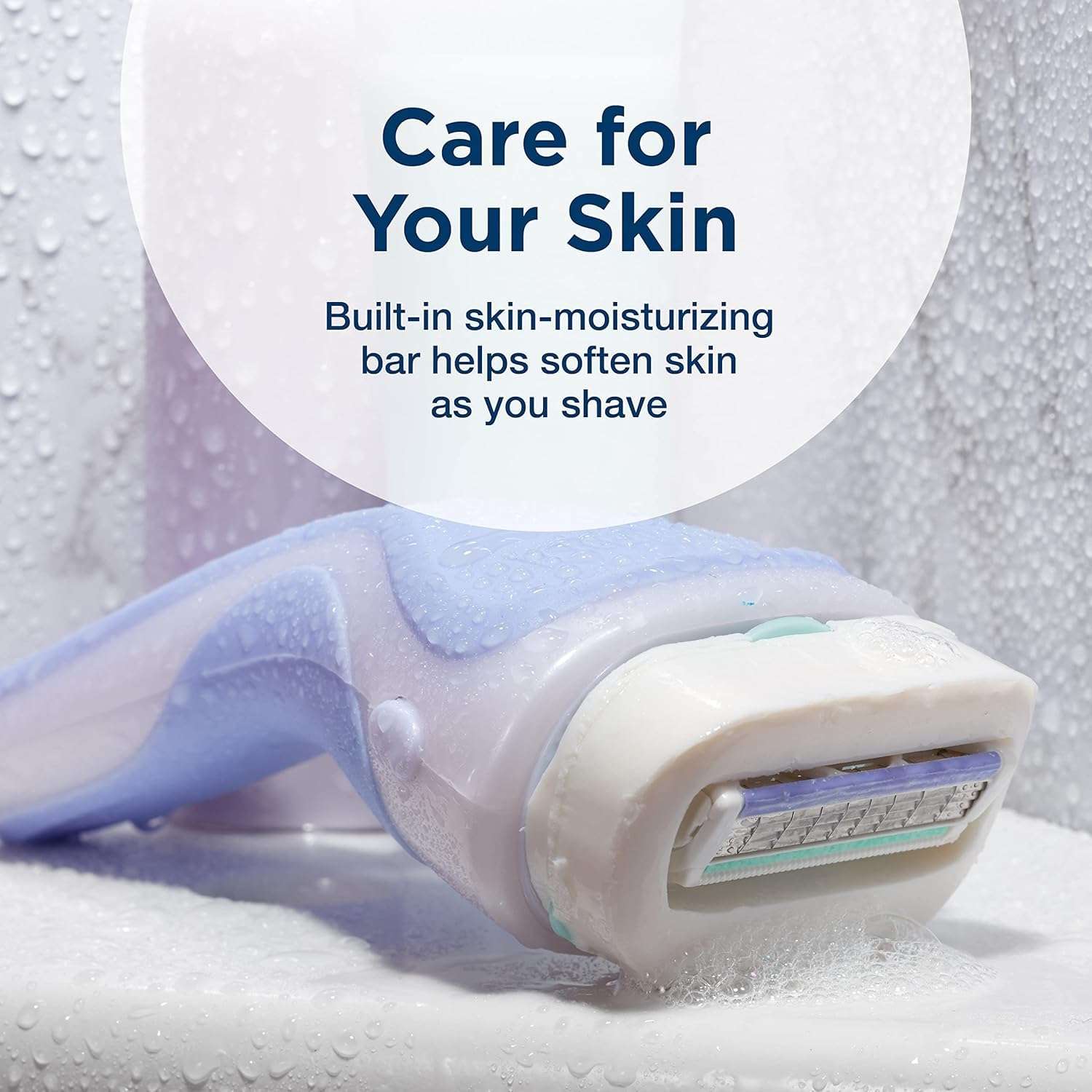 Lavender razor with built in moisturizing bar and blades shown for Schick Intuition razor refill cartridges
