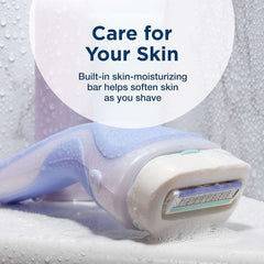 Lavender razor with built in moisturizing bar and blades shown for Schick Intuition razor refill cartridges