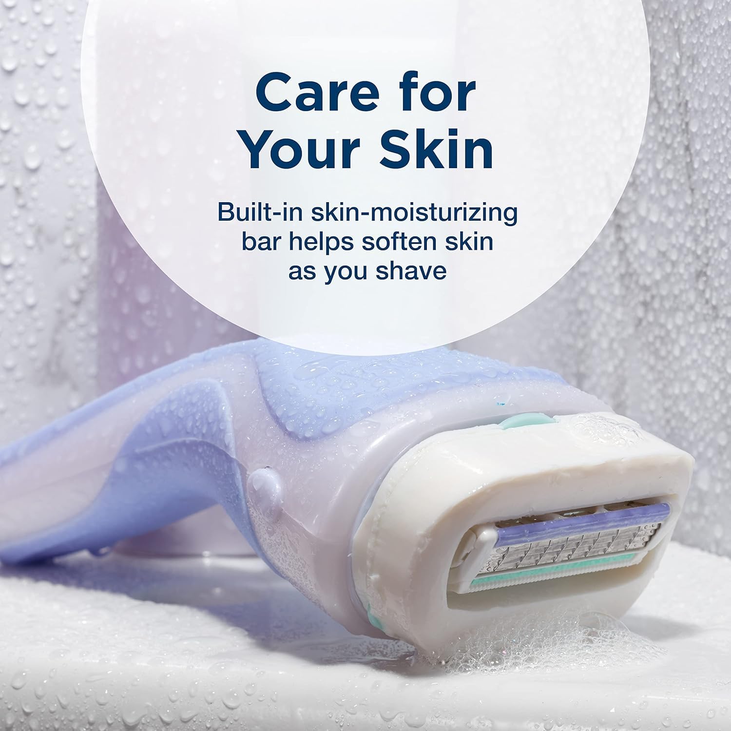 Lavender razor with built in moisturizing bar and blades shown for Schick Intuition razor refill cartridges
