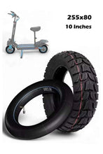 Off-road inflatable tire with inner tube, showing deep tread pattern and sidewall detail