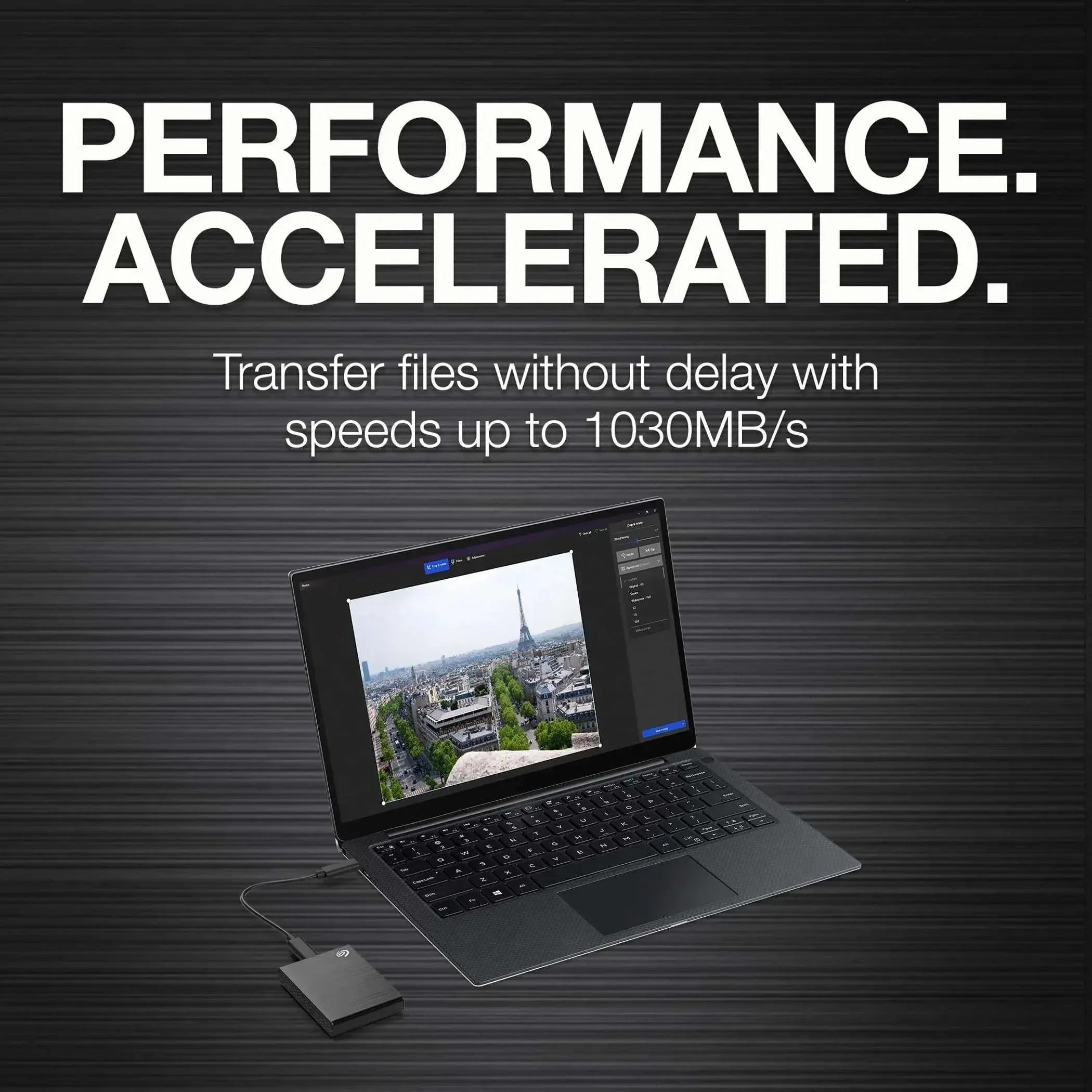 Portable SSD shown near a laptop for high-speed file transfers
