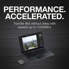 Portable SSD shown near a laptop for high-speed file transfers