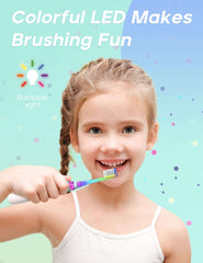 Seago kids electric toothbrush with timer shown in use by smiling girl holding colorful LED rainbow light toothbrush