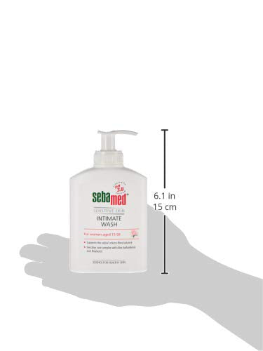 Sebamed intimate wash for women pump 200 ml white bottle shown on palm with size 6 inches tall