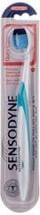 Sensodyne toothbrush for sensitive teeth. Soft blue bristles ergonomic white teal handle in blister pack