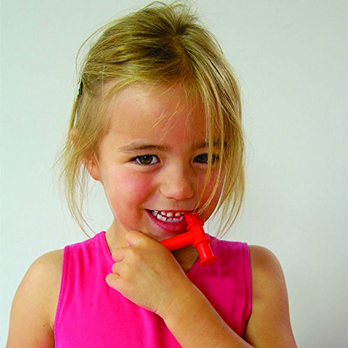Smiling young girl biting a red Chewy Tube sensory chew toy for oral motor support chewy tubes for kids UAE