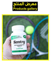 Sentry adults multivitamin supplement from 21st Century in hand with tennis equipment in background
