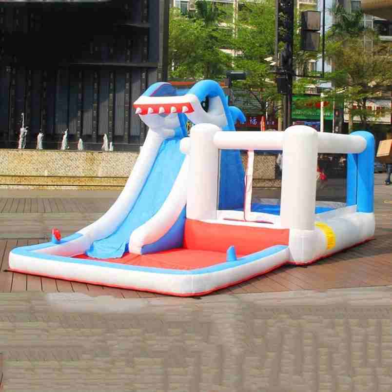 Huitich inflatable bounce shark themed water slide for kids with blue slide and red base