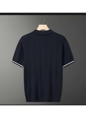 Huitich black short sleeve polo shirt L XL UAE with white trim on sleeves hanging on hanger