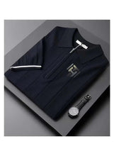 Folded short-sleeve polo shirt in dark navy with white-trim collar and chest logo.