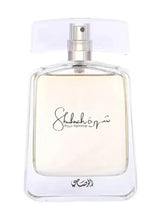 Women’s EDP perfume bottle, clear glass with gold cap and Shuhrah label