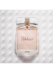 Rasasi Shuhrah perfume for women in elegant glass bottle with soft pink hue