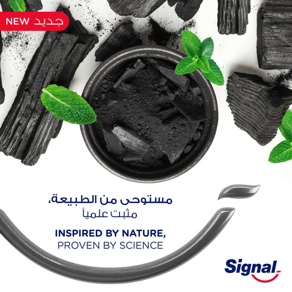 Signal Complete 8 Nature Elements toothpaste smear with charcoal pieces mint leaves and Signal logo