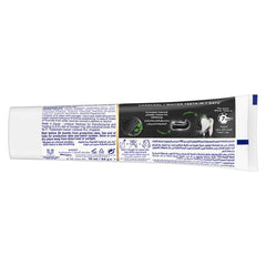 Back of Signal Complete 8 Nature Elements toothpaste tube showing ingredients label and charcoal whitening claims