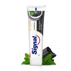 Tube of Signal Complete 8 Nature Elements toothpaste charcoal with mint leaves and charcoal piece on white background