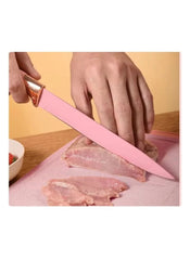 Huitich pink knife cutting meat from 19 piece kitchen tool set UAE on wooden table