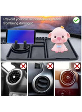 Black silicone dashboard anti-skid mat with textured surface and numbered storage slots