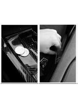 Black silicone dashboard anti-skid mat with textured compartments for coins and bottle