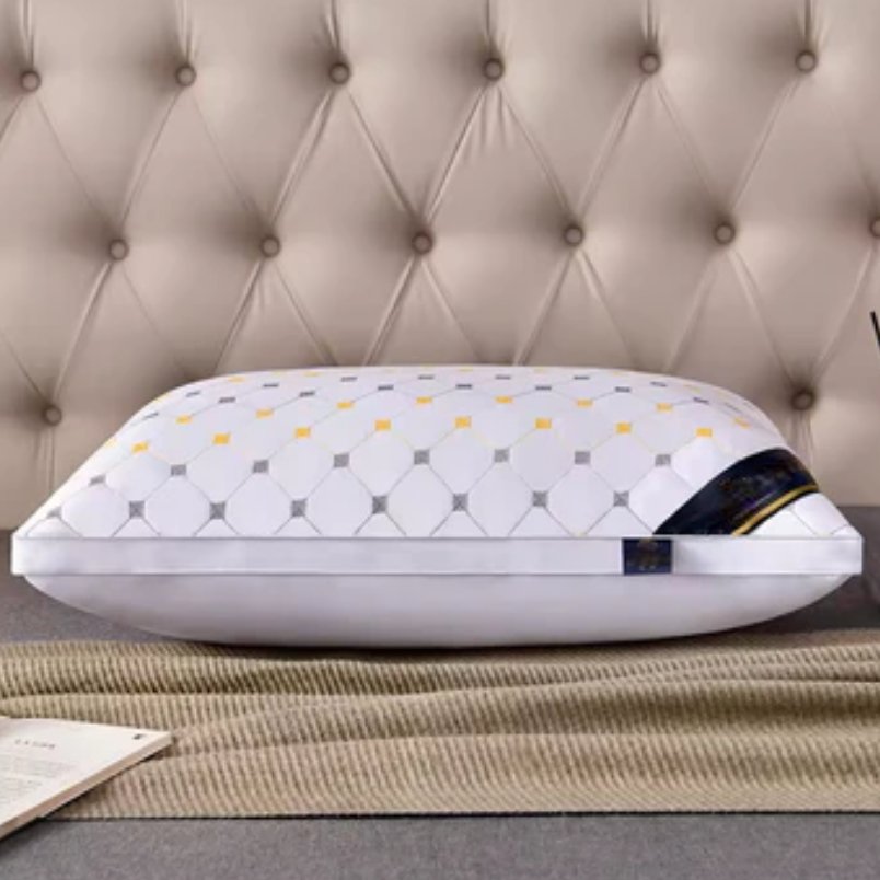 Huitich pillow with silky polyester pillowcase for bedroom featuring a geometric pattern on a beige tufted headboard