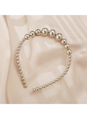 Huitich pearl hair accessory for kids with graduated shiny pearl beads headband on beige background