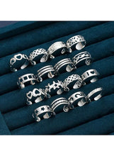 Silver tone stackable rings set with star and striped details, 16-piece