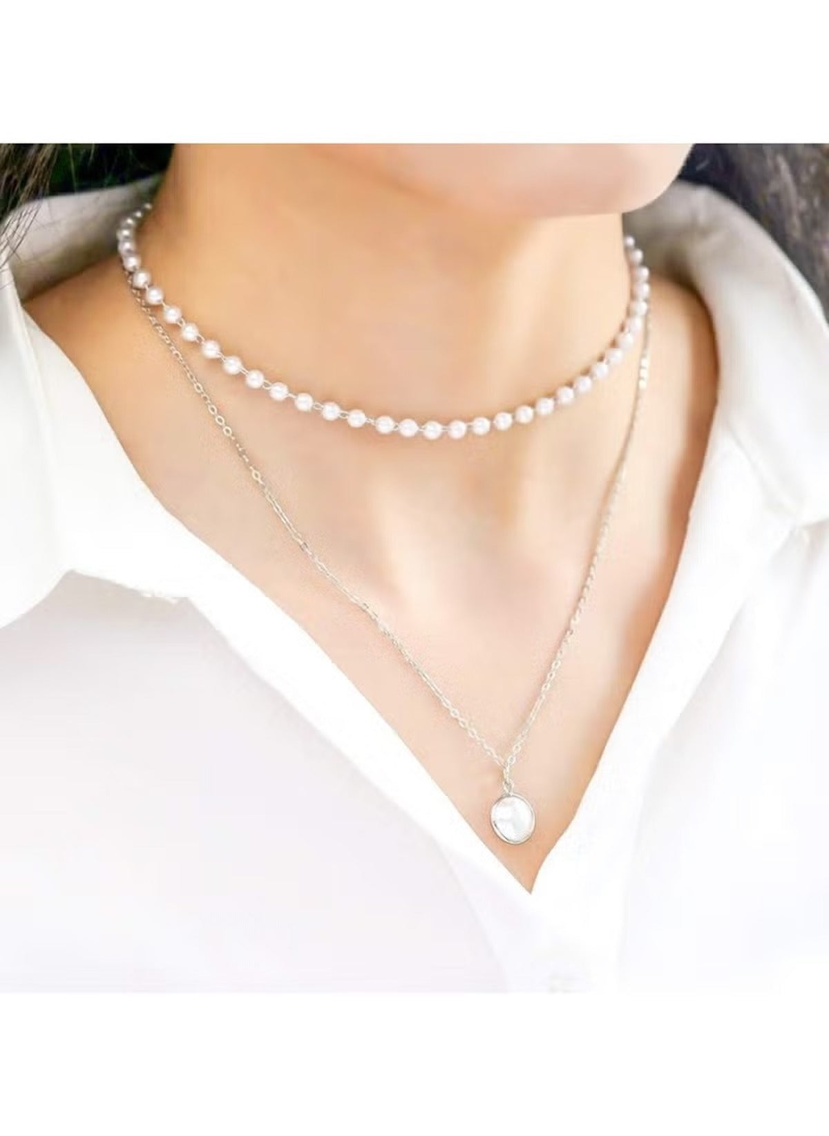 Huitich silver tone fashion necklace for women with layered chains and pendant on model