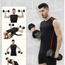 Black hex dumbbell in hand during standing exercise, chrome handle