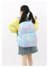 Light blue galaxy trolley school bag shown from back with padded straps