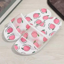 White open-toe sandals with peach fruit print and cushioned front strap
