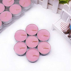 Huitich pink flameless smokeless tea light candles arranged in a flower shape on white surface