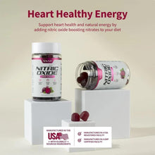 Gummy supplement bottle with loose red capsules and product label on display
