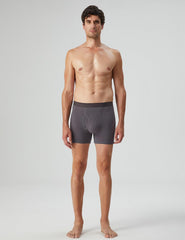 Natural Feelings soft cotton mens boxer shorts in dark gray worn by male model standing