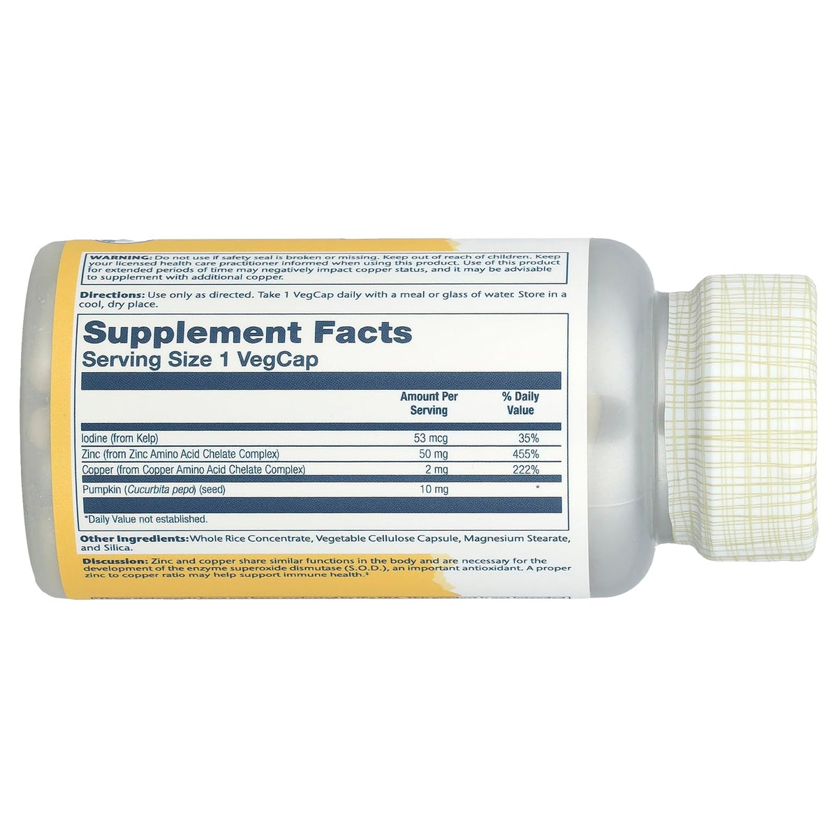 SOLARAY bottle showing Supplement Facts label of zinc and copper supplement capsules lying on side