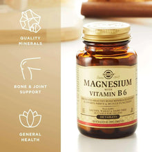 Magnesium with Vitamin B6 supplement bottle standing on a surface with label visible