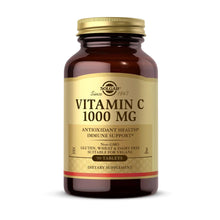 Vitamin C 1000 mg supplement bottle, brown glass with gold cap and beige label