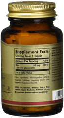 Solgar zinc tablets 50mg amber glass bottle showing supplement facts label Zinc 50 mg serving size 1 tablet