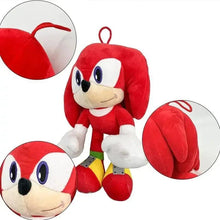 Knuckles stuffed doll plush with red hood, white face, blue eyes, yellow shoes