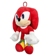 Knuckles stuffed doll plush in seated pose, red hood, white gloves and yellow shoes