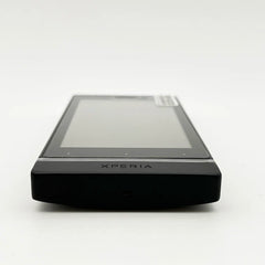 Black Sony Xperia U ST25i unlocked smartphone front edge view showing touchscreen Xperia logo and slim profile