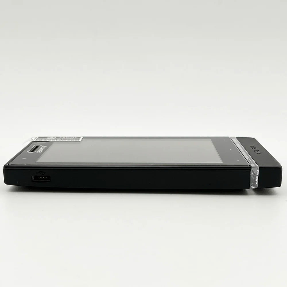 Sony Xperia U ST25i unlocked smartphone black side profile showing slim design and micro USB port by Mumzar